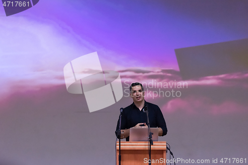 Image of businessman giving presentations at conference room