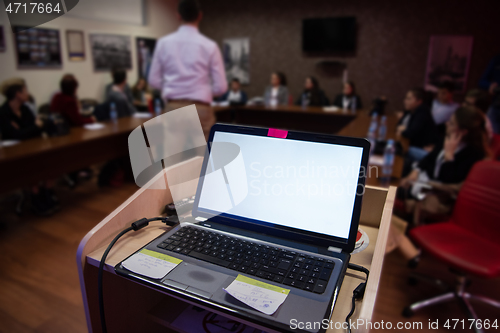 Image of laptop computer at podium