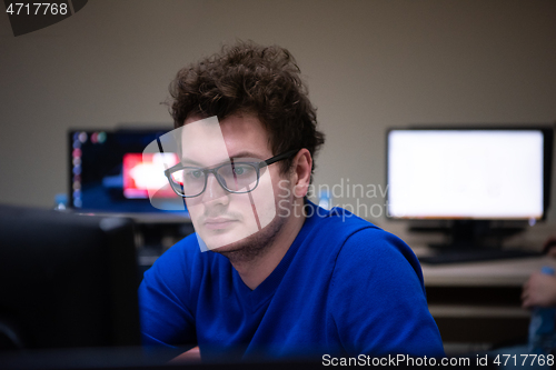 Image of businessman working using a computer in startup office