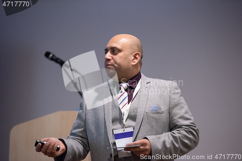 Image of businessman giving presentations at conference room