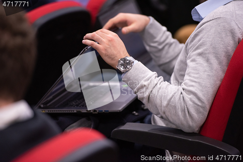 Image of business people hands using laptop computer