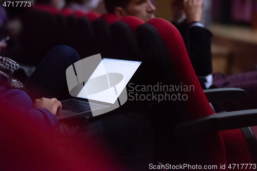 Image of business people hands using laptop computer