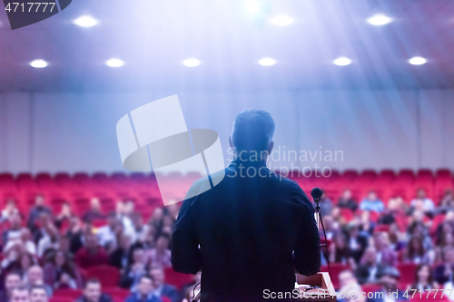 Image of businessman giving presentations at conference room