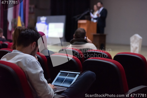 Image of business people hands using laptop computer