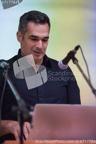 Image of businessman giving presentations at conference room