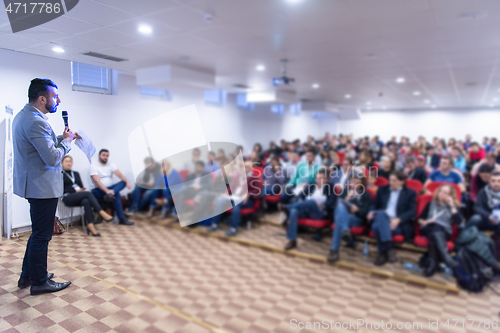 Image of businessman giving presentations at conference room