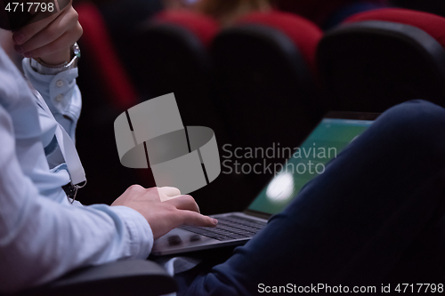 Image of business people hands using laptop computer