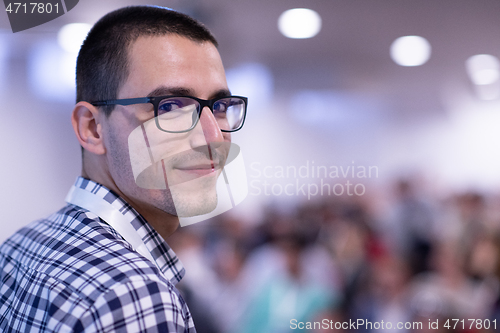 Image of businessman giving presentations at conference room