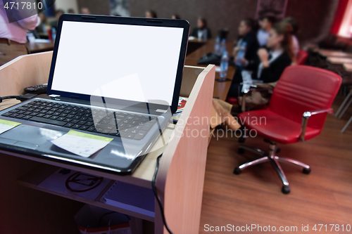 Image of laptop computer at podium