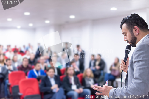 Image of businessman giving presentations at conference room