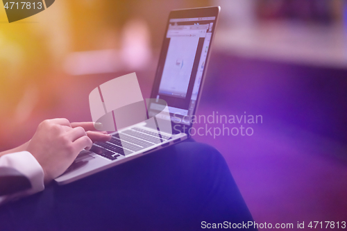 Image of business people hands using laptop computer