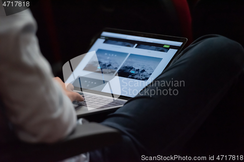 Image of business people hands using laptop computer