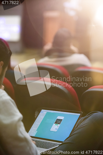 Image of business people hands using laptop computer