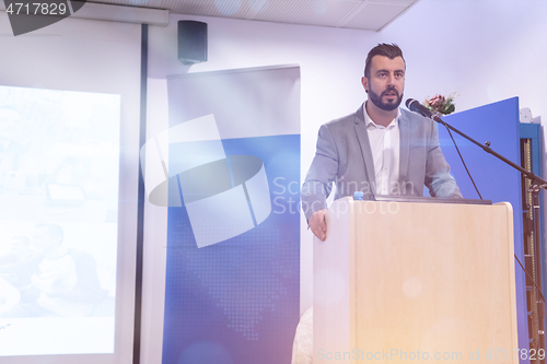 Image of businessman giving presentations at conference room