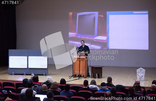 Image of businessman giving presentations at conference room