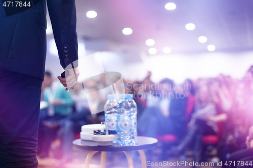 Image of businessman giving presentations at conference room