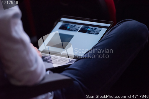 Image of business people hands using laptop computer