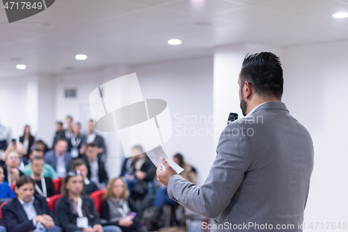 Image of businessman giving presentations at conference room