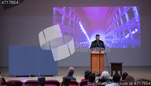 Image of businessman giving presentations at conference room