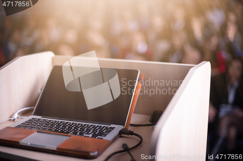 Image of laptop computer at podium