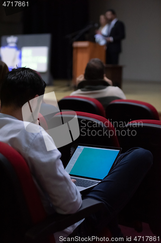 Image of business people hands using laptop computer