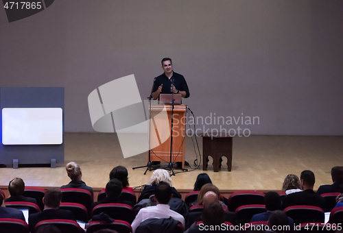 Image of businessman giving presentations at conference room