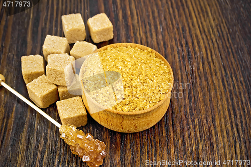 Image of Sugar brown in bowl on wooden board