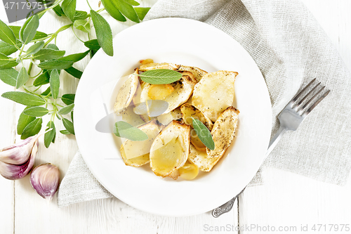 Image of Parsnips baked in plate on board top