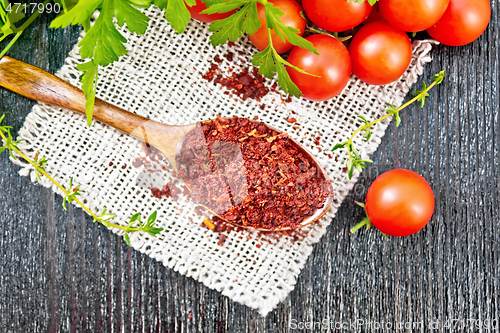 Image of Tomatoes dried in spoon on board top