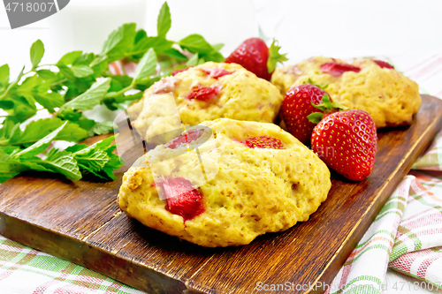 Image of Scones with strawberry on light board