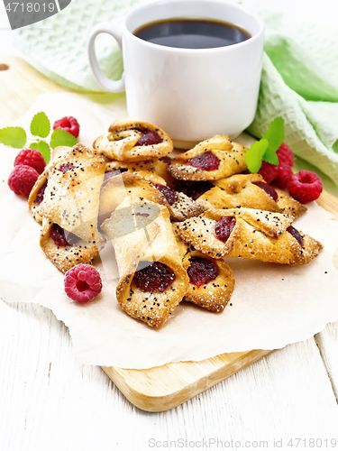 Image of Cookies with raspberries on light board