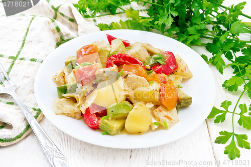 Image of Ragout vegetable with zucchini on white board