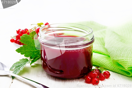 Image of Jam of red currant in jar on light board