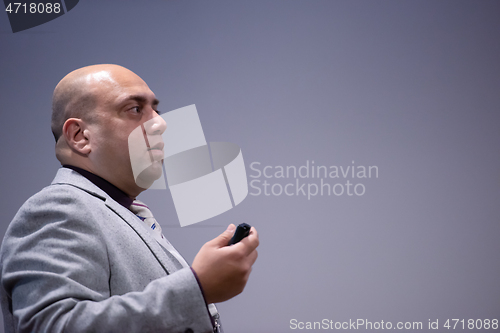 Image of businessman giving presentations at conference room