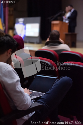 Image of business people hands using laptop computer