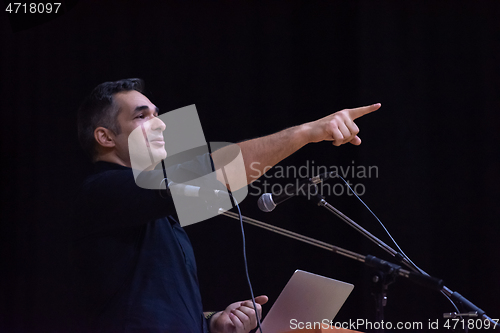 Image of businessman giving presentations at conference room