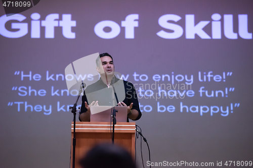 Image of businessman giving presentations at conference room