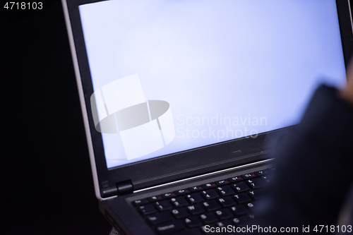 Image of business people hands using laptop computer