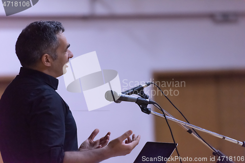 Image of businessman giving presentations at conference room