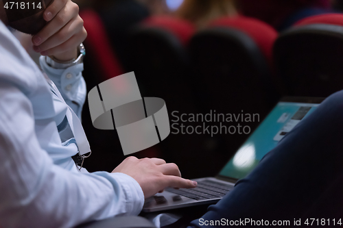 Image of business people hands using laptop computer