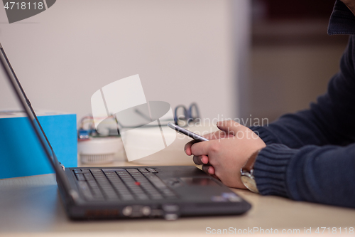 Image of business people hands using smart phone