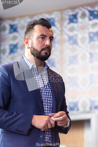 Image of businessman giving presentations at conference room