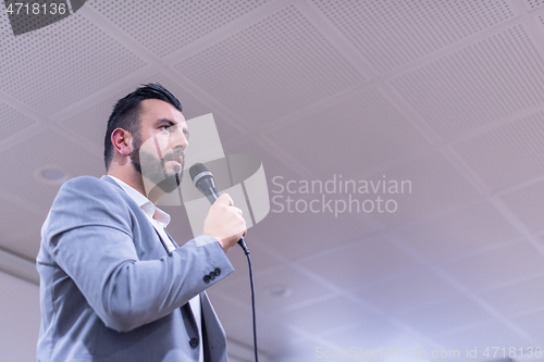 Image of businessman giving presentations at conference room