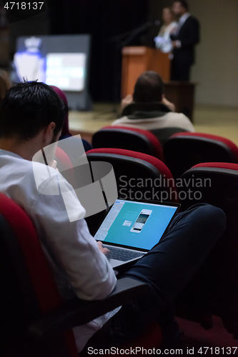 Image of business people hands using laptop computer