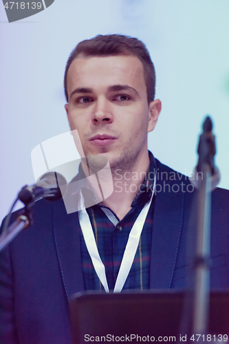 Image of businessman giving presentations at conference room