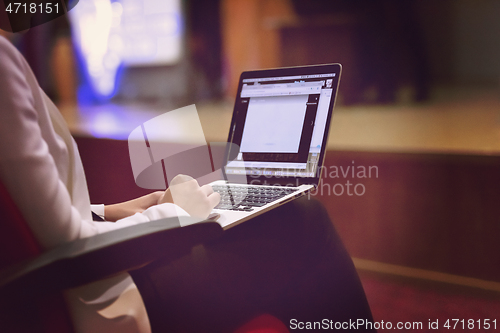 Image of business people hands using laptop computer