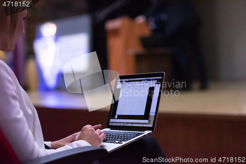 Image of business people hands using laptop computer