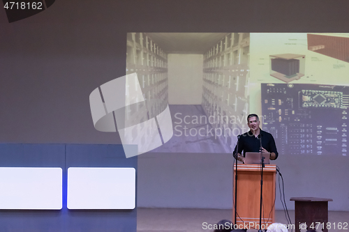 Image of businessman giving presentations at conference room