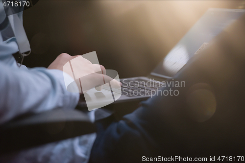 Image of business people hands using laptop computer