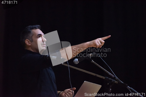 Image of businessman giving presentations at conference room